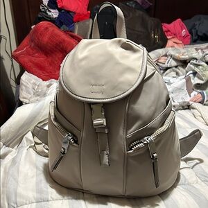 Calvin Klein Shay Nylon Front Buckle Zip Around Mini Backpack